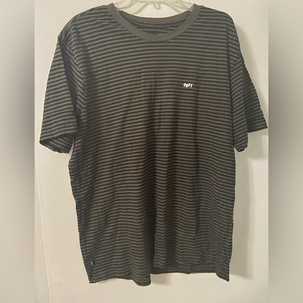 Obey green and black stripped t-shirt.